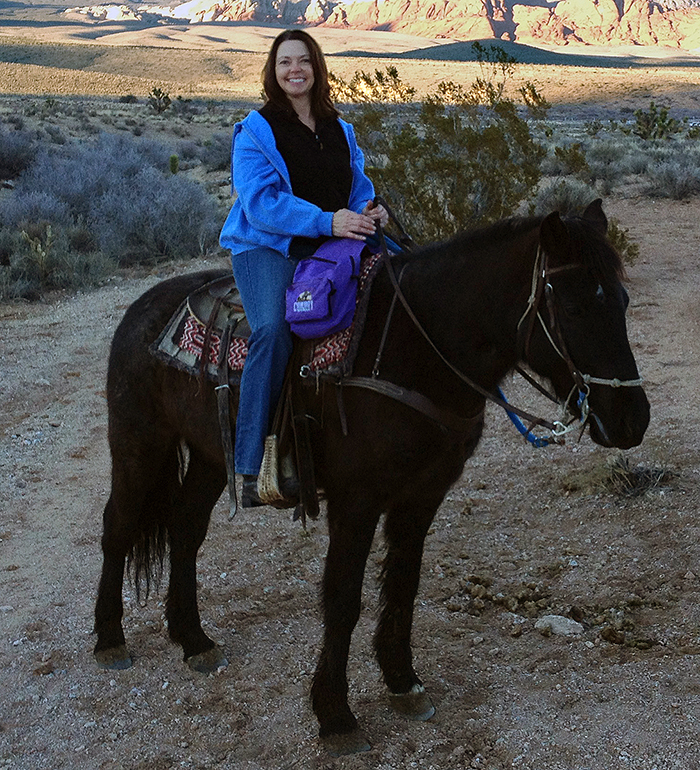 Photo of Kim Nash while Horseback Riding near Las Vegas at Cowboy Trail Rides